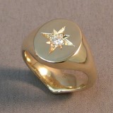 Moissanite star set secret signet ring